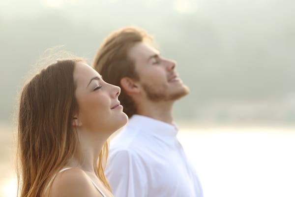 couple breathing peacefully advertising a health seminar